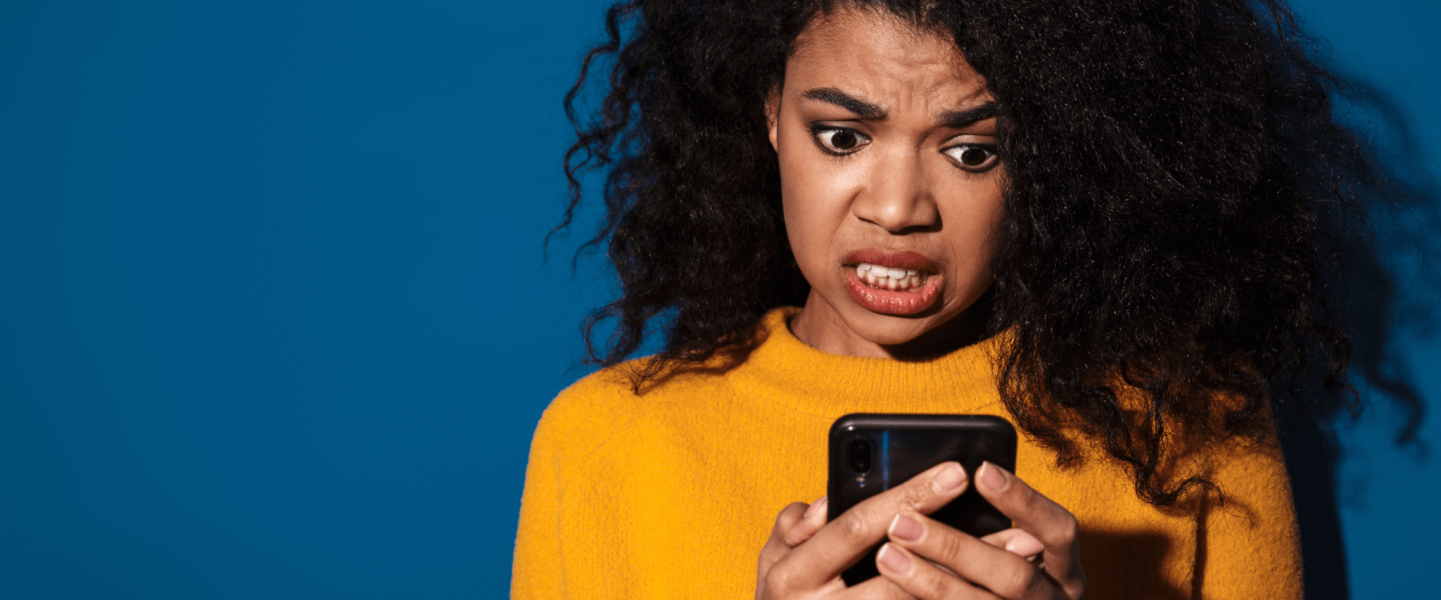 A woman looking up how to improve her 598 credit score.