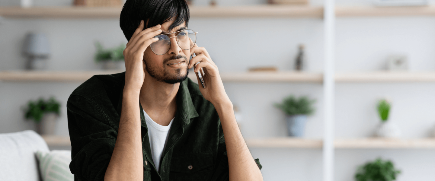 A man looking to improve and learn more about his 614 credit score.