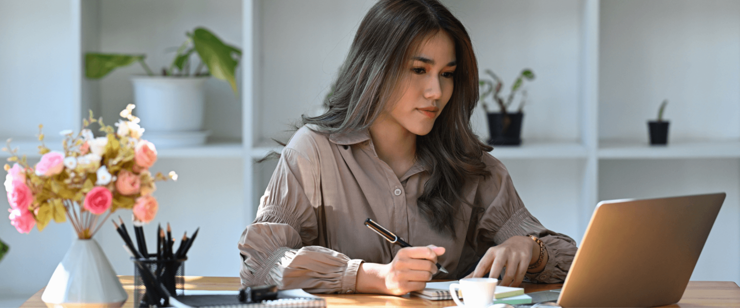 A woman working on her laptop