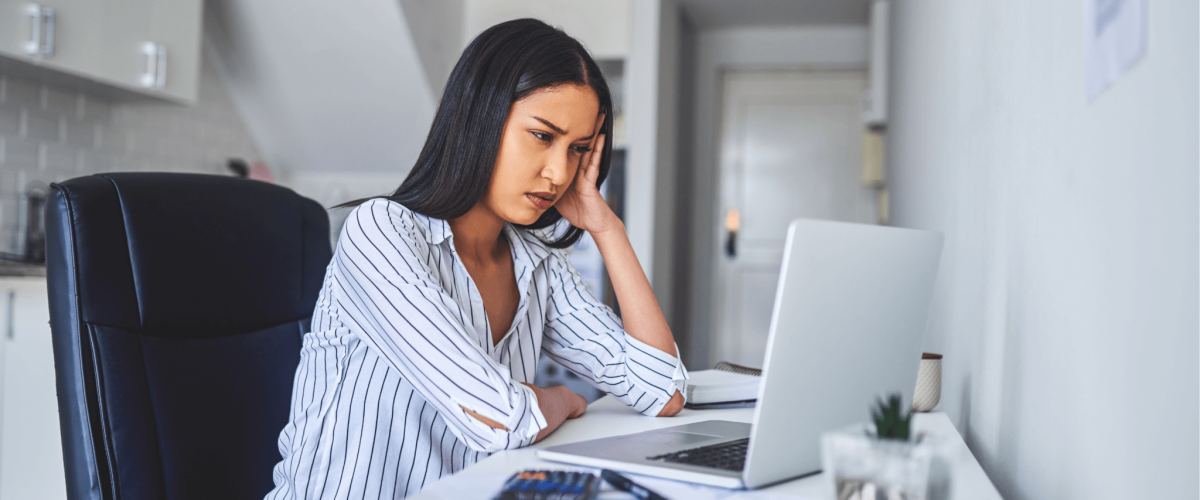 person looking confused at their computer