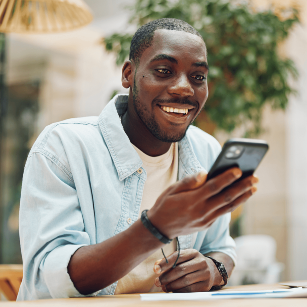 A man researching the best Credit Karma Alternatives.