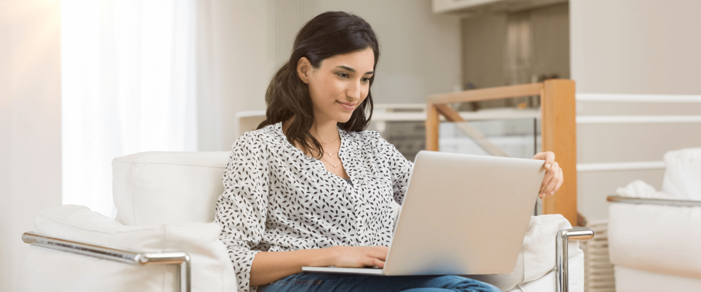 Woman researching on her laptop.