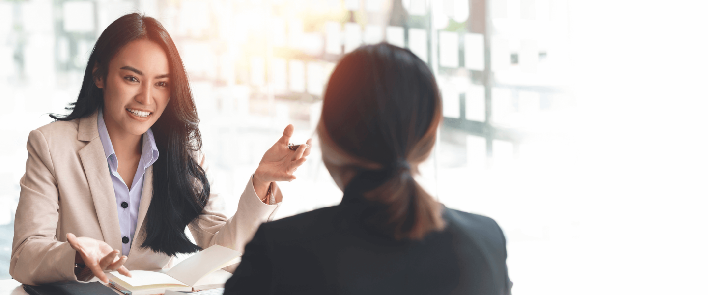 two people talking business