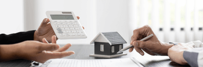 A person buying a house after improving their 500 credit score.