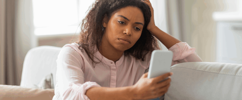 A woman learning what her 567 credit score means and how to improve it
